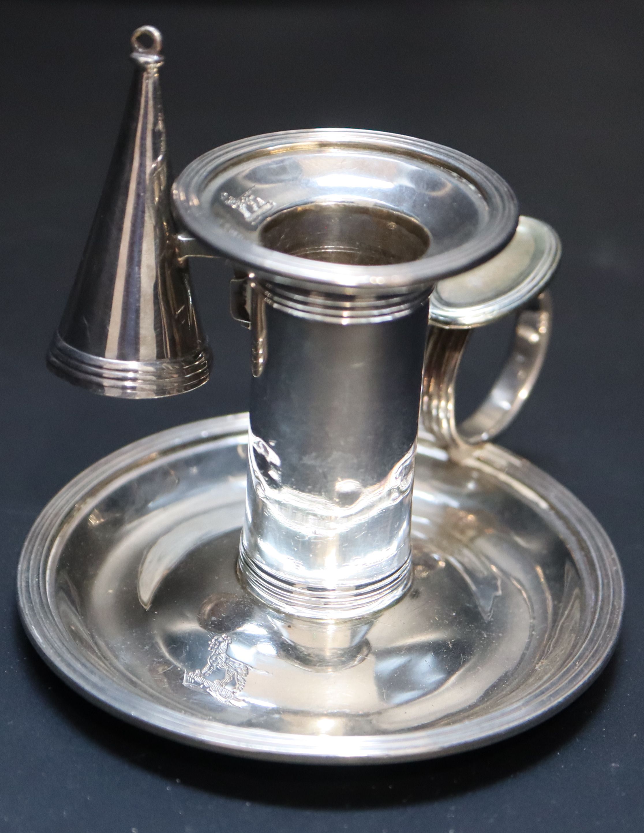 A George III silver miniature chamberstick, height 7.2cm, 96 grams.